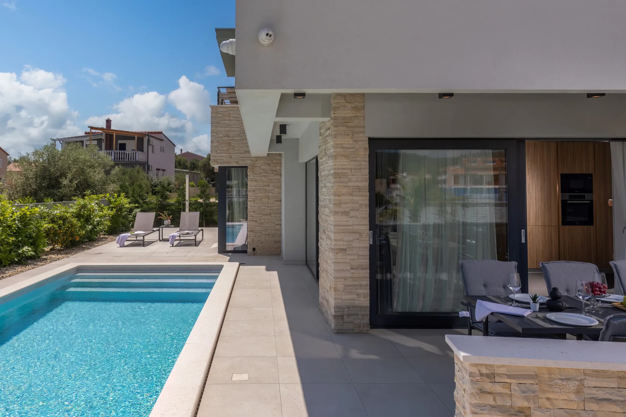 Pool area with landscaping